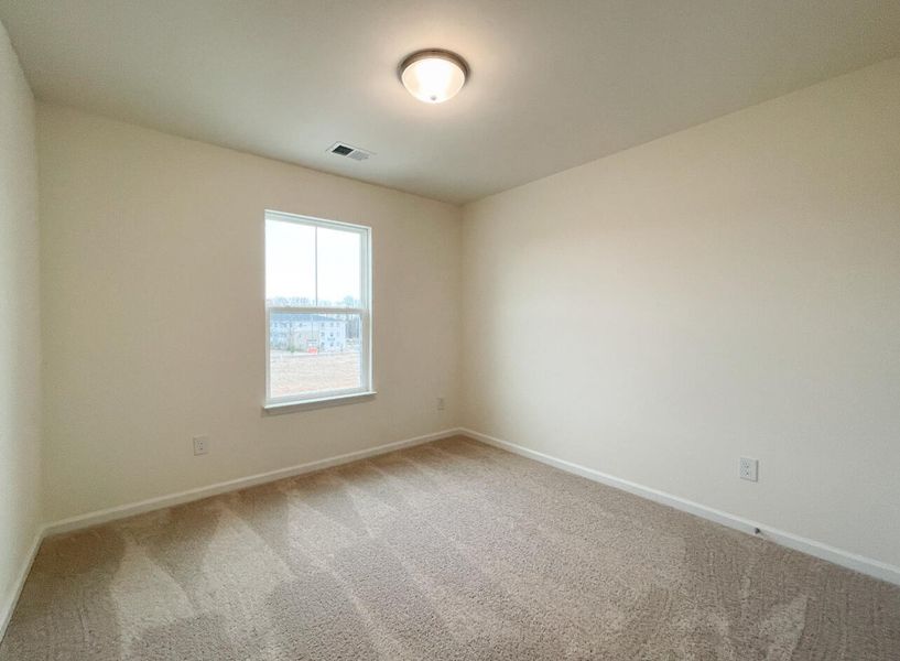 Spacious, unfurnished interior of a new home in Bellevue Townhomes, Greenville (Image 16).