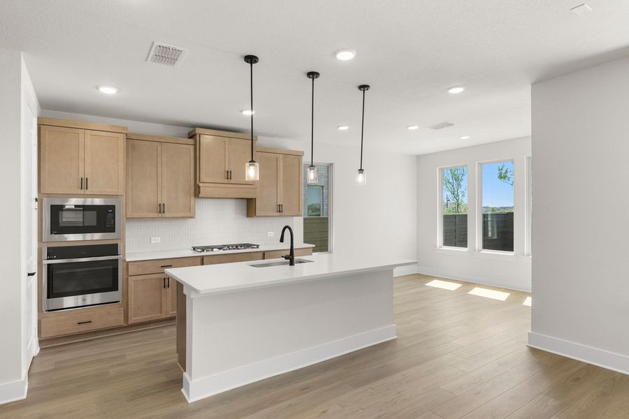 Furnished interior view inside a new home in Union Park, Little Elm (Image 6).