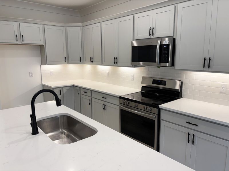 Furnished interior view inside a new home in Young Oaks, Crestview (Image 7).