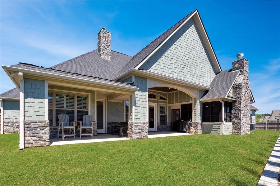 Exterior details and patio area of a home in , Flint (Image 21).