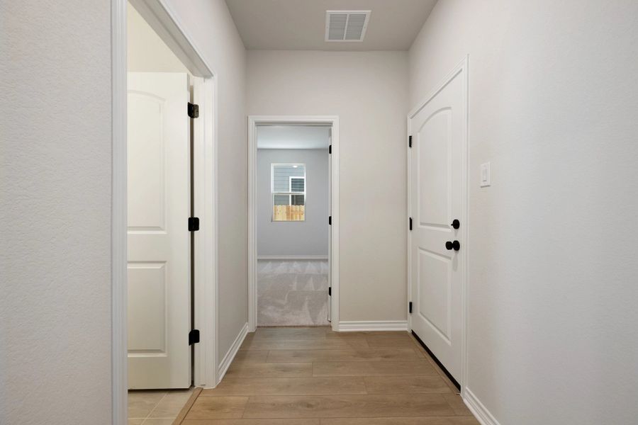 Spacious, unfurnished interior of a new home in The Homestead at Lariat, Liberty Hill (Image 25).