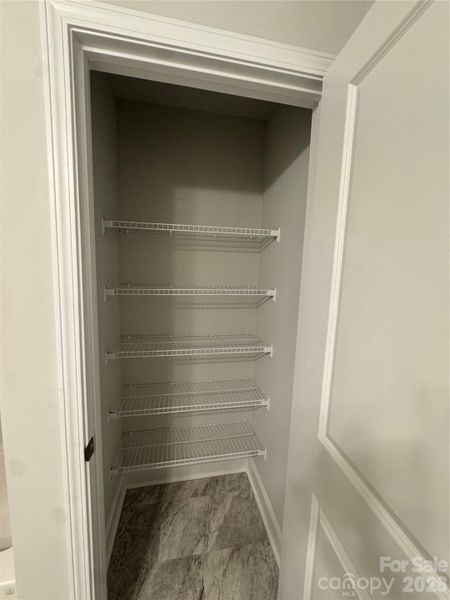 linen closet in hall bathroom
