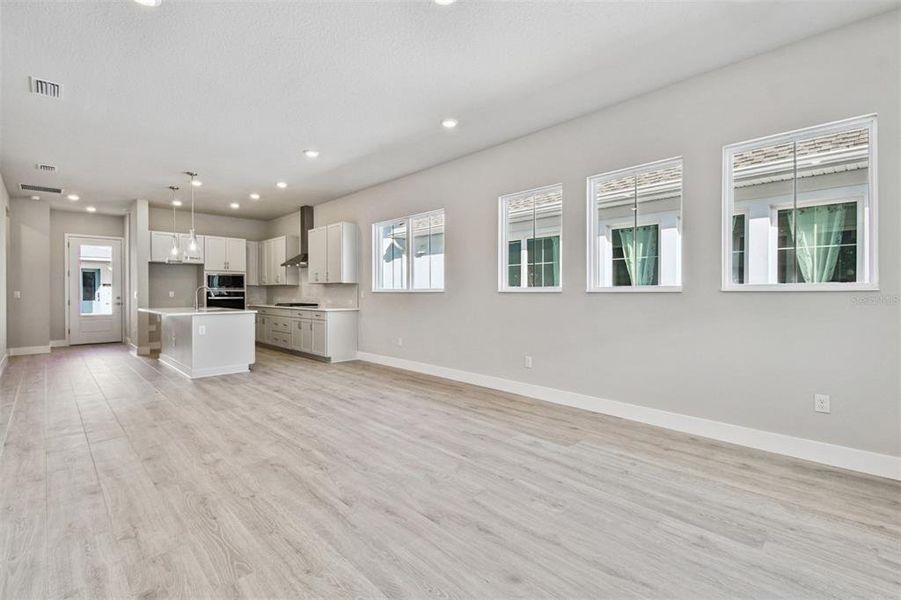 Spacious, unfurnished interior of a new home in Emerald Landing at Waterside at Lakewood Ranch – Cottage Series, Sarasota (Image 29). Spacious, unfurnished interior of a new home in Emerald Landing at Waterside at Lakewood Ranch – Cottage Series, Sarasota (Image 29).