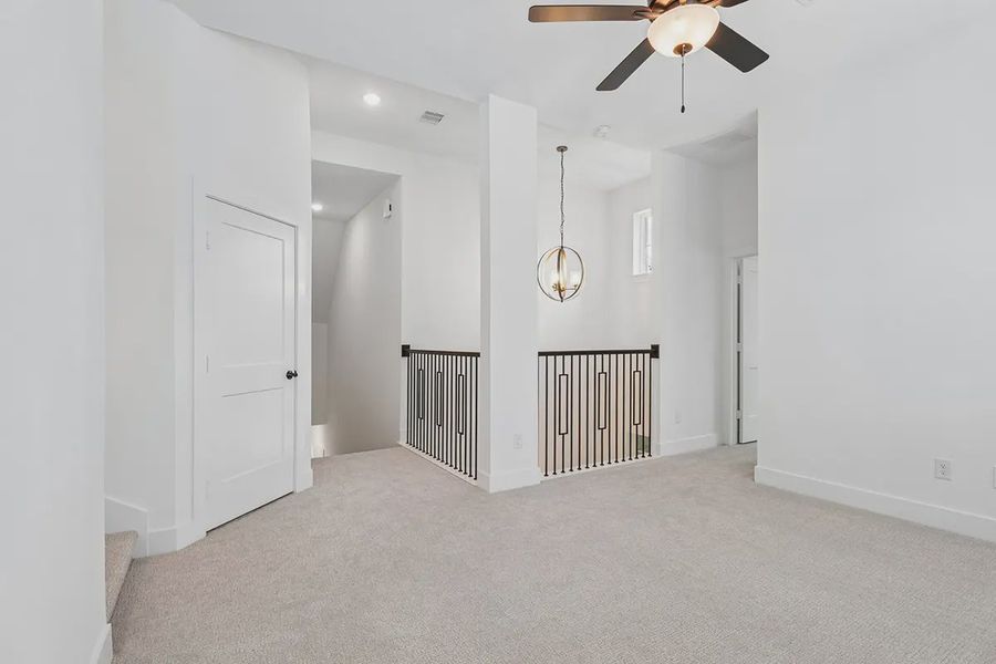 Spacious, unfurnished interior of a new home in Parkside on the River, Georgetown (Image 32).