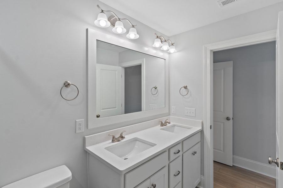Representative furnished interior of a home built from the Sand Dune by Bill Clark Homes in Osprey Landing, Southport (Image 11).