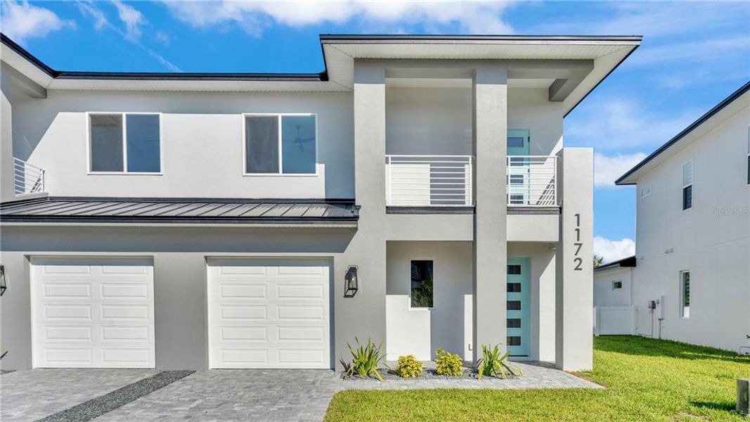 Front exterior of a new home in , Lakeland, FL, highlighting curb appeal (Image 25). Front exterior of a new home in , Lakeland, FL, highlighting curb appeal (Image 25).