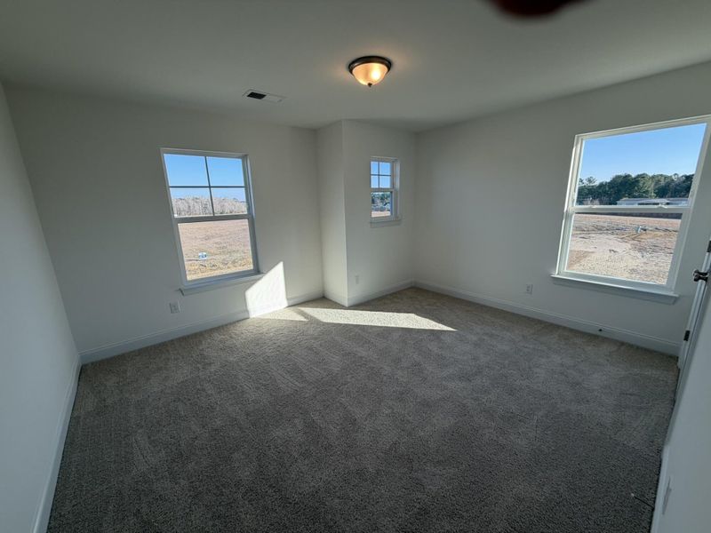 Spacious, unfurnished interior of a new home in Black Forest Pointe, Benson (Image 18).