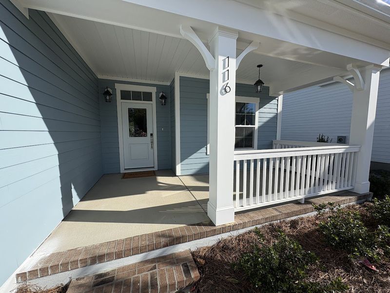 Exterior details and patio area of a home in Riverside Cove, Wilmington (Image 2).