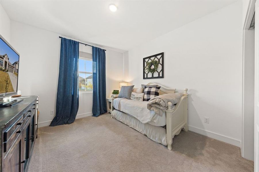 Dedicated bedroom within the guest suite, offering privacy and comfort