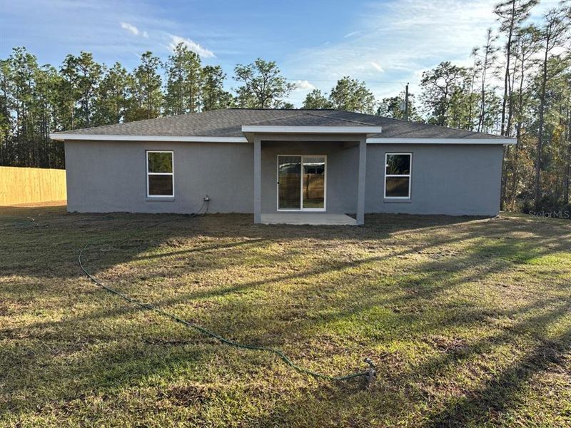 Exterior details and patio area of a home in , Citrus Springs (Image 3).