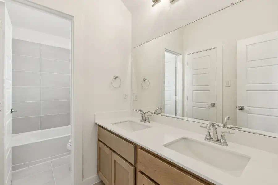 Bathroom in the Da Vinci II home plan by Trophy Signature Homes – REPRESENTATIVE PHOTO