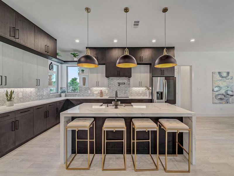 Kitchen with stainless steel fridge, backsplash, recessed lighting, a kitchen bar, and dark brown cabinets