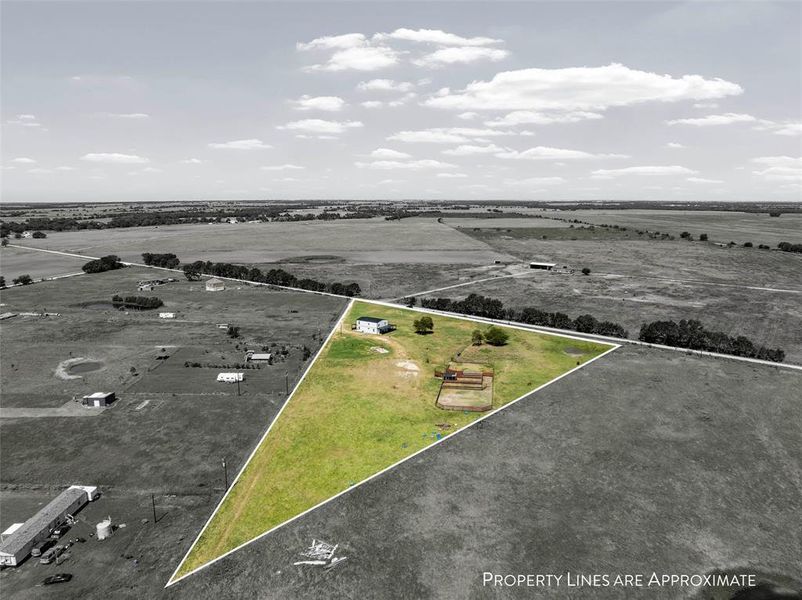 Aerial view of sparsely populated area featuring property parcel outlined Aerial view of sparsely populated area featuring property parcel outlined