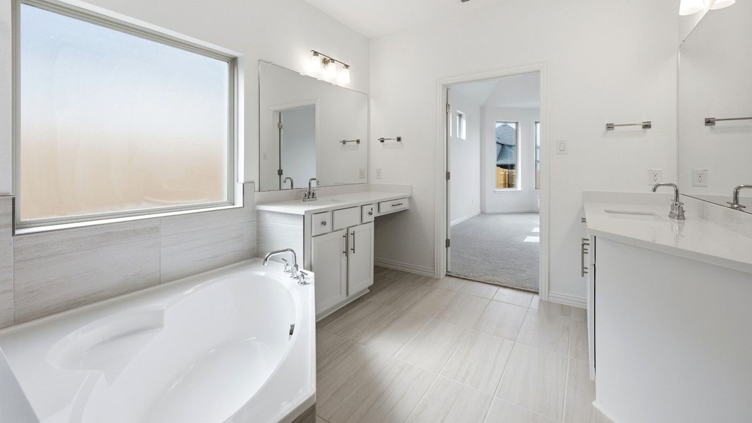 Furnished interior view inside a new home in Oaks at San Gabriel, Georgetown (Image 18).
