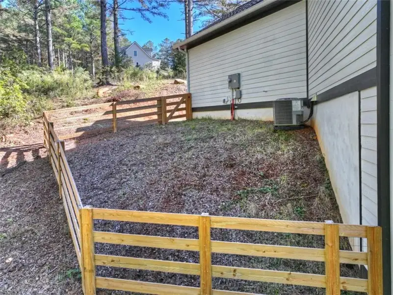 Exterior details and patio area of a home in , Ellijay (Image 25).