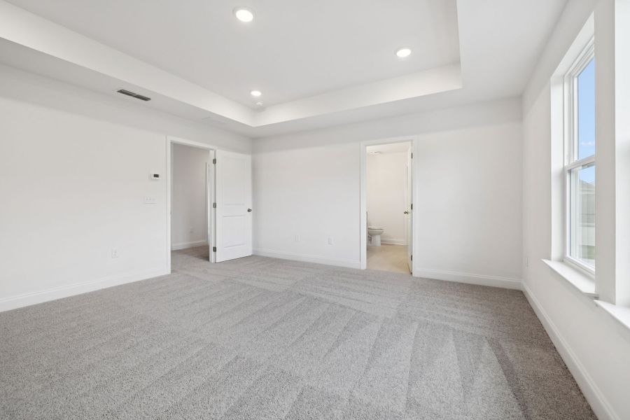 Representative unfurnished interior of a home built from the Montgomery by Ashton Woods in Cades Bluff, Lebanon (Image 18).