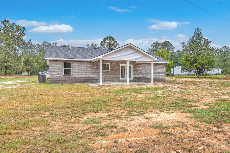Exterior details and patio area of a home in , Pineville (Image 21). Exterior details and patio area of a home in , Pineville (Image 21).