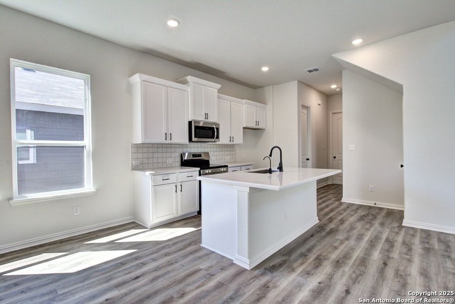 Furnished interior view inside a new home in Casinas at Gruene, New Braunfels (Image 6).