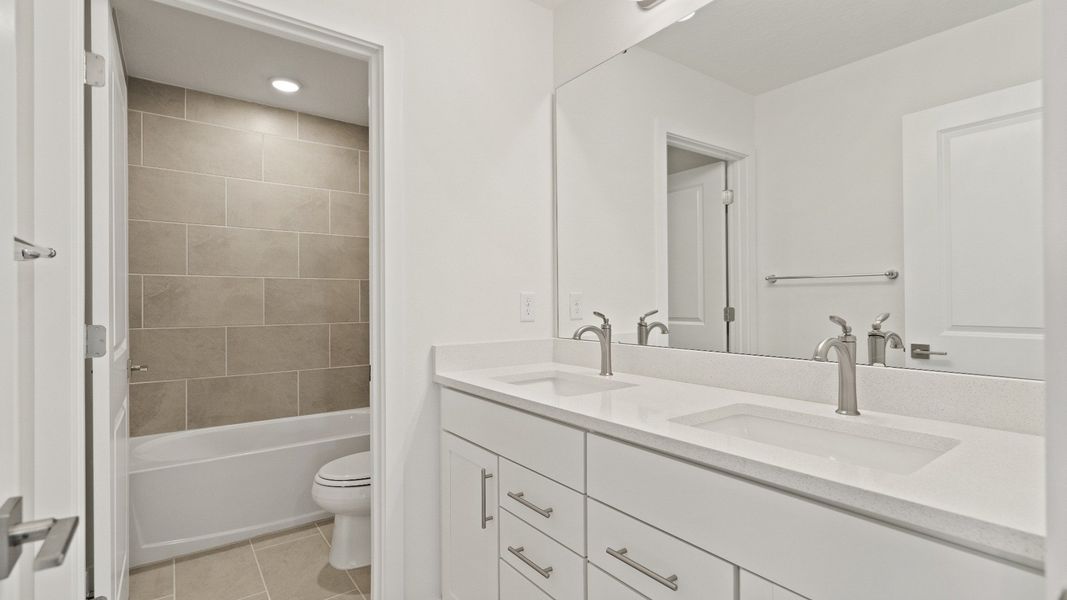 Highbourne Secondary Bath by DRB Homes in Willowbrook North located in Winter Haven, FL. Highbourne Secondary Bath by DRB Homes in Willowbrook North located in Winter Haven, FL.