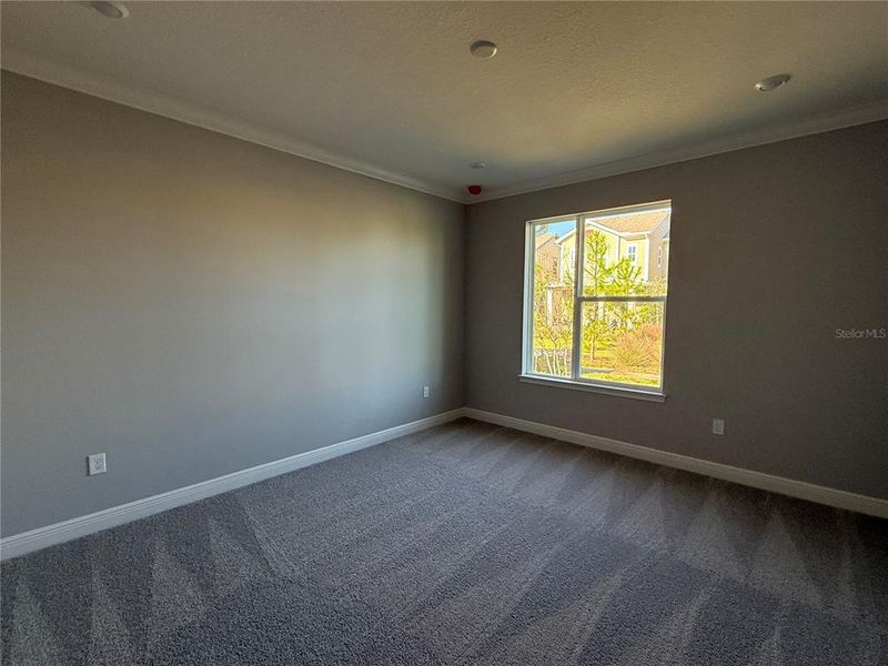 Spacious, unfurnished interior of a new home in Laureate Park, Orlando (Image 23).