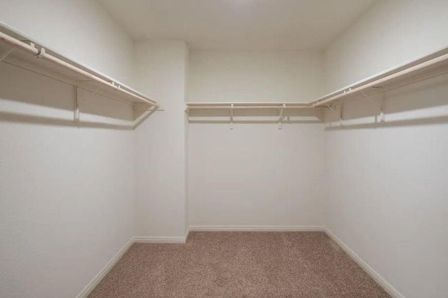 Walk-in Closet in Primary Bedroom - Representative Photo