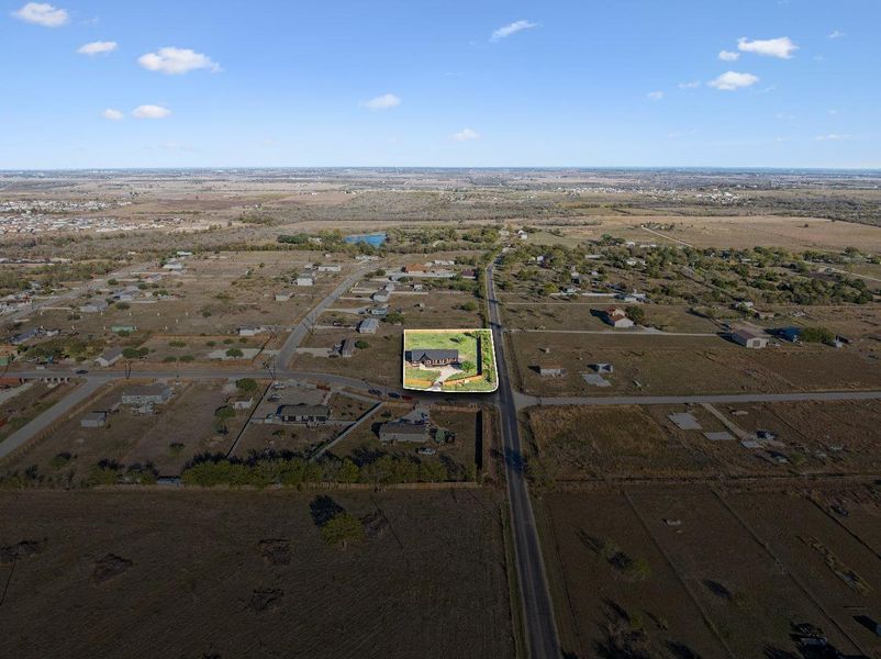 Aerial view of property and surrounding area with rural landscape Aerial view of property and surrounding area with rural landscape