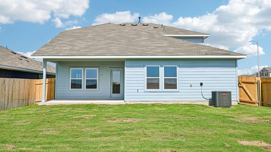 Exterior details and patio area of a home in Carillon, Manor (Image 3).