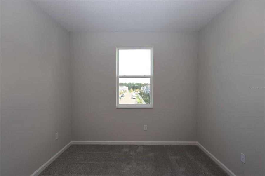 Spacious, unfurnished interior of a new home in Tribute at Ovation, Winter Garden (Image 16).