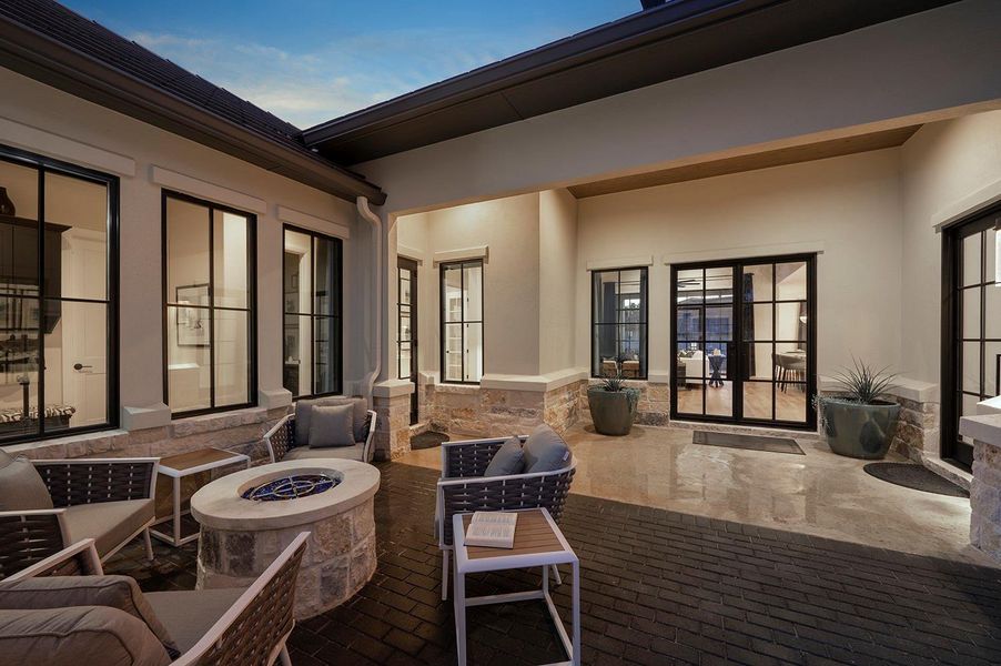 Photo is representative of floorplan but is not specific to this address. Firepit not included.