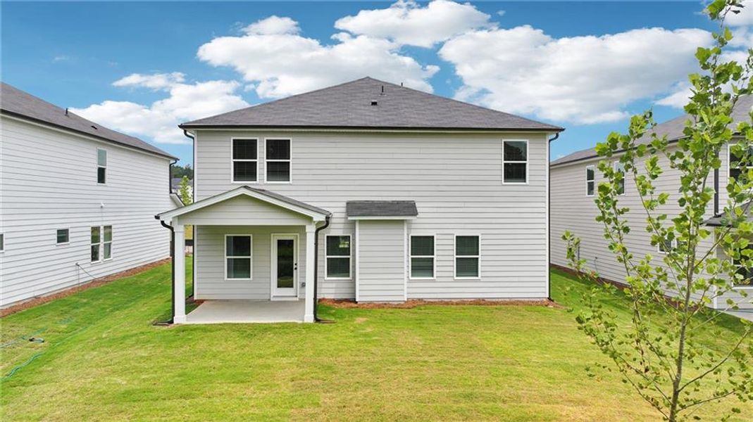 Front exterior of a new home in Vines at Mill Creek - Estate Series, Braselton, GA, highlighting curb appeal (Image 19).