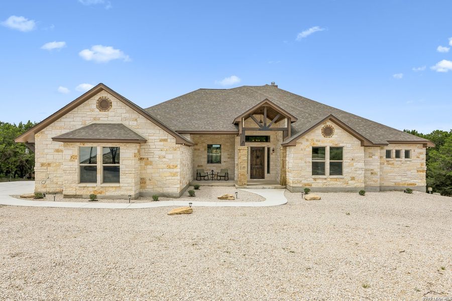 Front exterior of a new home in , New Braunfels, TX, highlighting curb appeal (Image 25). Front exterior of a new home in , New Braunfels, TX, highlighting curb appeal (Image 25).