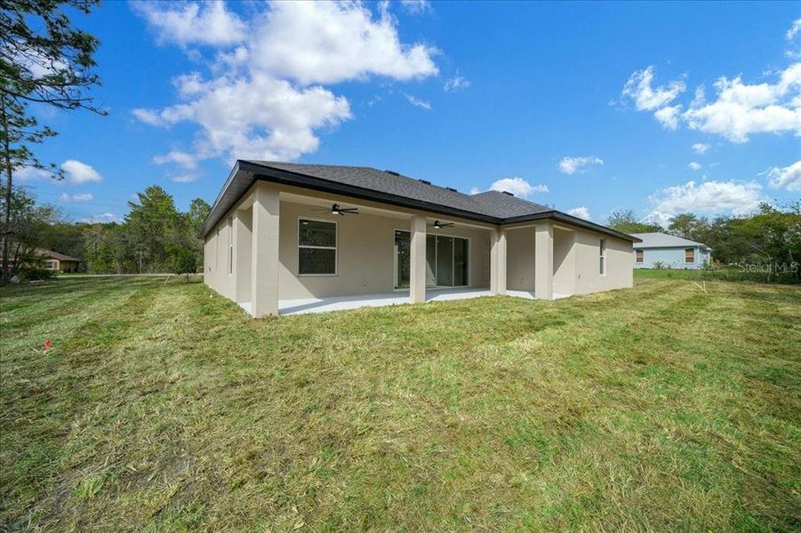 Exterior details and patio area of a home in , Weeki Wachee (Image 38).