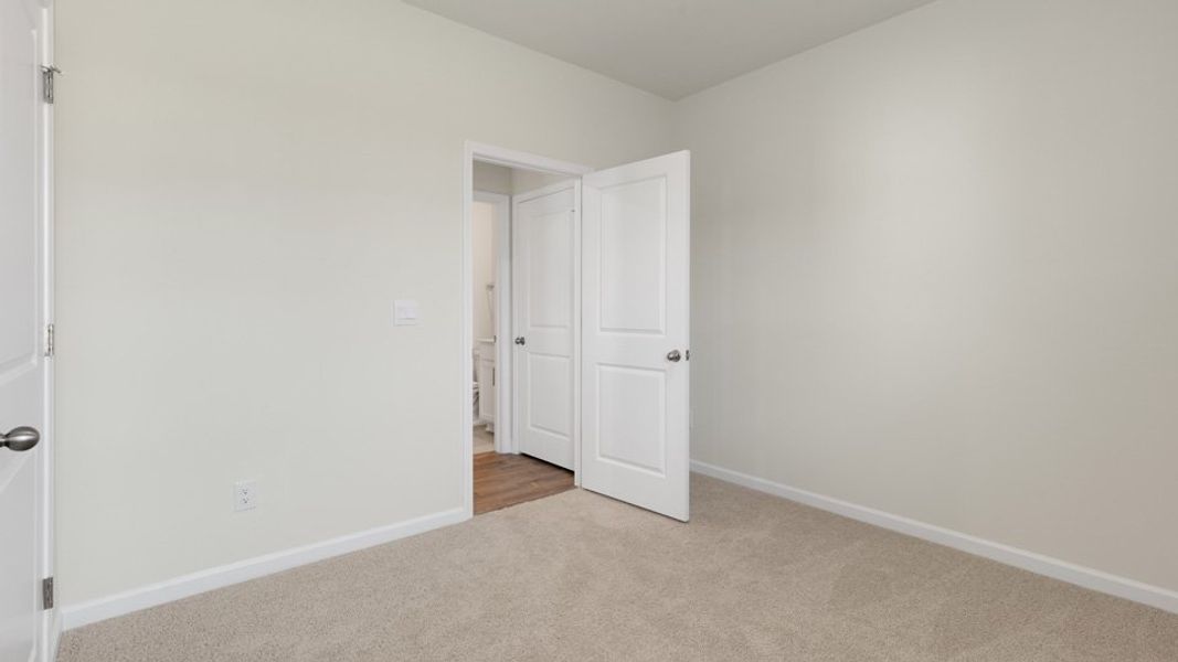 Spacious, unfurnished interior of a new home in The Grove at Matthews Landing, Fuquay Varina (Image 19).