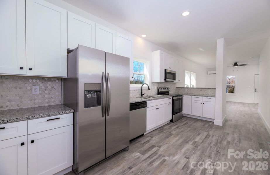 Furnished interior view inside a new home in , Candler (Image 8).