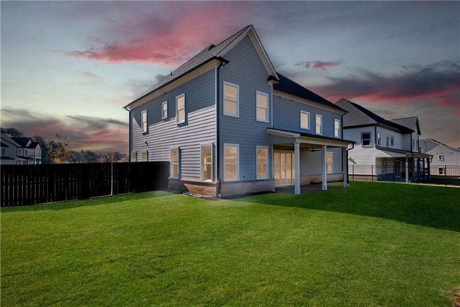 Exterior details and patio area of a home in The Retreat at Caney Creek, Alpharetta (Image 35).