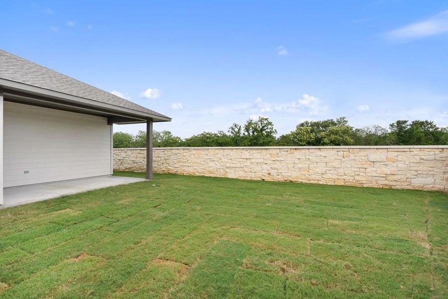 Exterior details and patio area of a home in Lagos Reserve, Manor (Image 22).