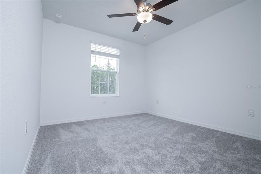 Spacious, unfurnished interior of a new home in Saddle Creek Preserve: The Manors II, Lakeland (Image 42).