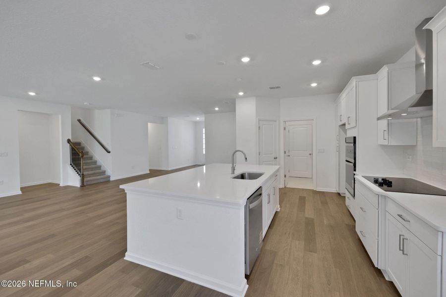 Furnished interior view inside a new home in Hyland Trail, Green Cove Springs (Image 6).