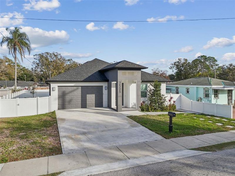 Front exterior of a new home in , Tampa, FL, highlighting curb appeal (Image 29).