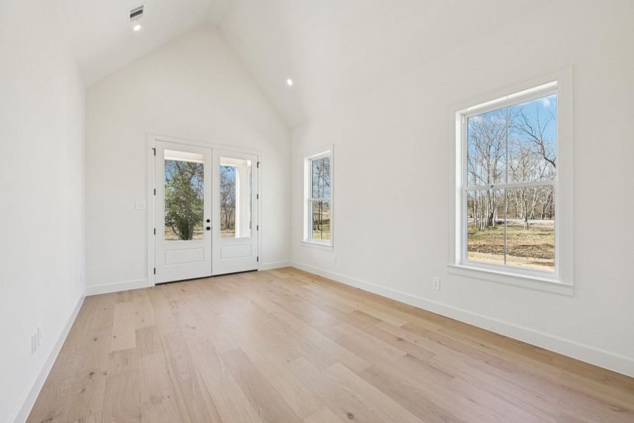Game room DOWN w/french doors to covered back patio Game room DOWN w/french doors to covered back patio