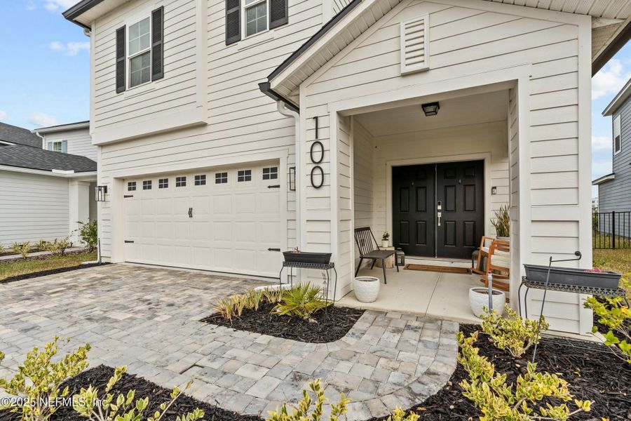 Front exterior of a new home in Silver Landing at SilverLeaf, St. Augustine, FL, highlighting curb appeal (Image 23).