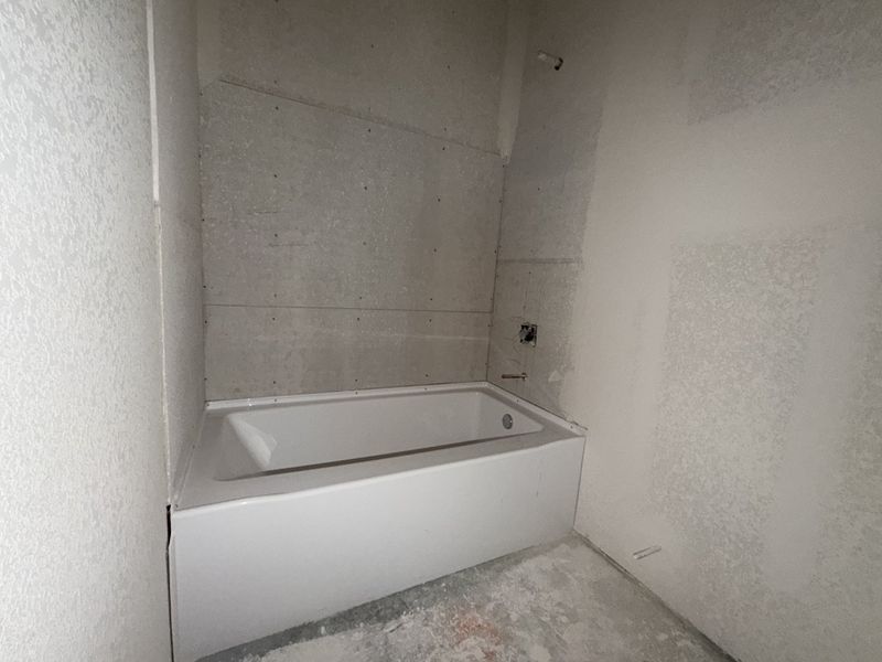 In-progress construction of a new home in Saddle Crest Estates, Weatherford, TX (Image 31).