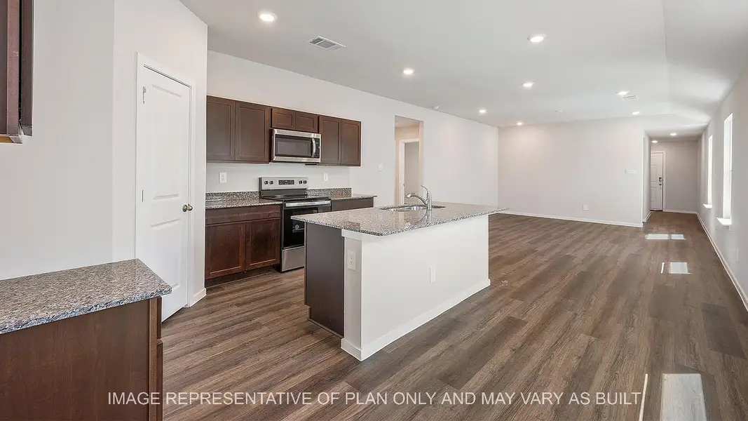 Furnished interior view inside a new home in Midtown Reserve, College Station (Image 5). Furnished interior view inside a new home in Midtown Reserve, College Station (Image 5).