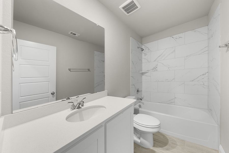 Representative exterior photo of a completed home built from the Chester by Impression Homes in Arcadia Trails, Balch Springs, TX (Image 24).