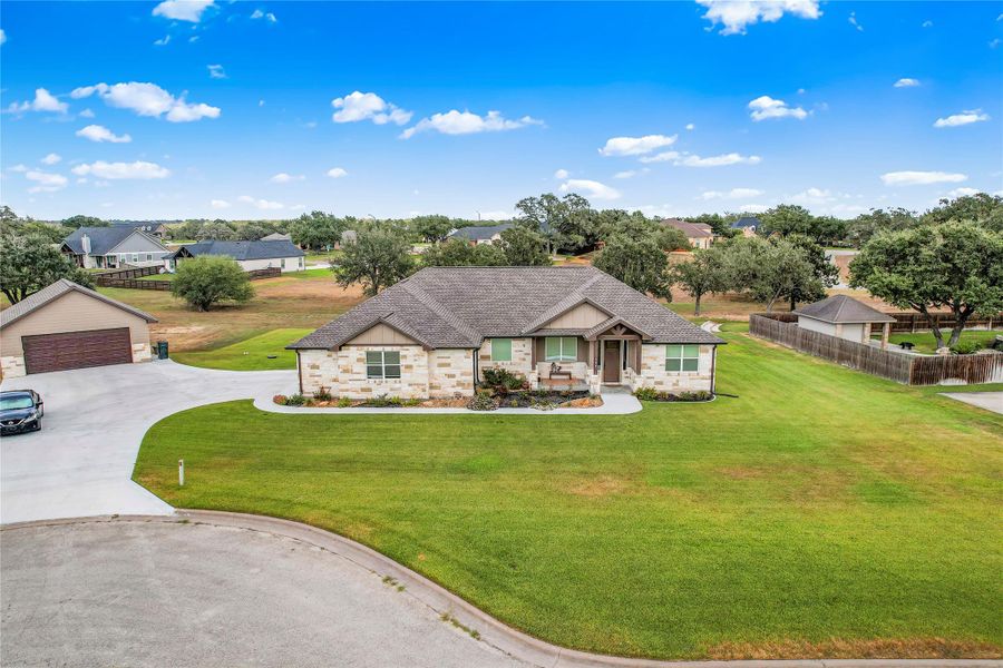 Front exterior of a new home in , Cuero, TX, highlighting curb appeal (Image 20).