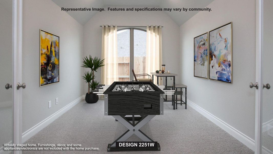 Recreation room with carpet flooring, lofted ceiling, and french doors Recreation room with carpet flooring, lofted ceiling, and french doors