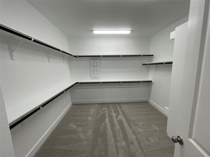Walk-in Closet in Primary Bedroom Walk-in Closet in Primary Bedroom
