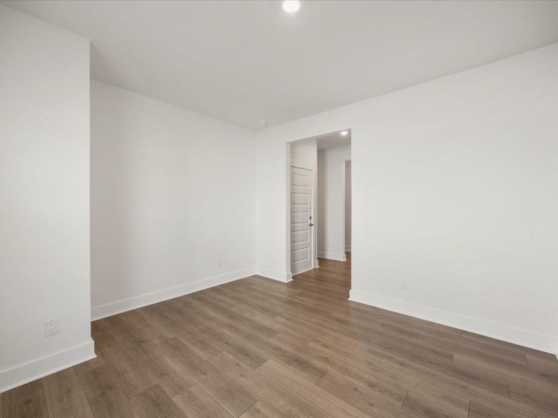 Spacious, unfurnished interior of a new home in The Coves at Lakes of Cane Bay, Summerville (Image 21). Spacious, unfurnished interior of a new home in The Coves at Lakes of Cane Bay, Summerville (Image 21).