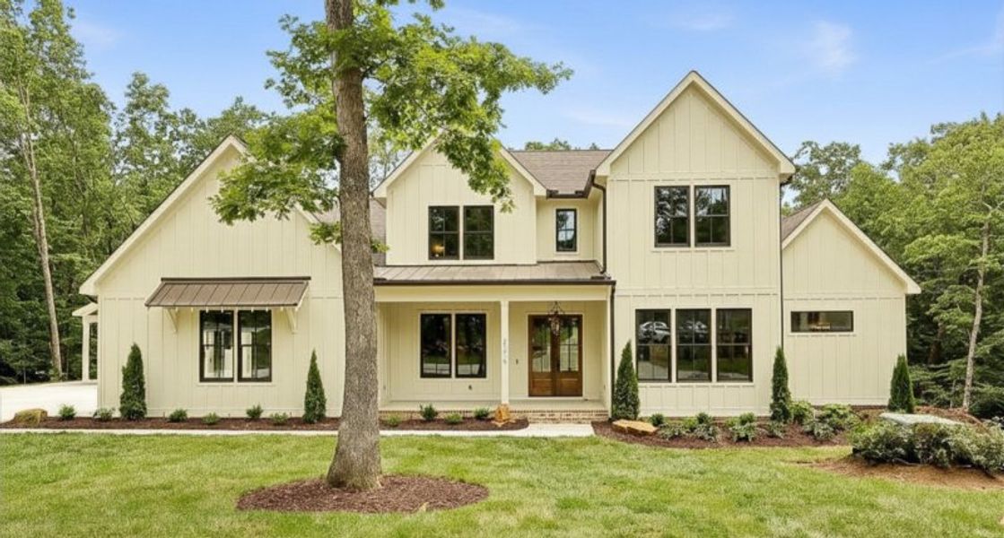 Front exterior of a new home in Hidden River, Signal Mountain, TN, highlighting curb appeal (Image 31). Front exterior of a new home in Hidden River, Signal Mountain, TN, highlighting curb appeal (Image 31).