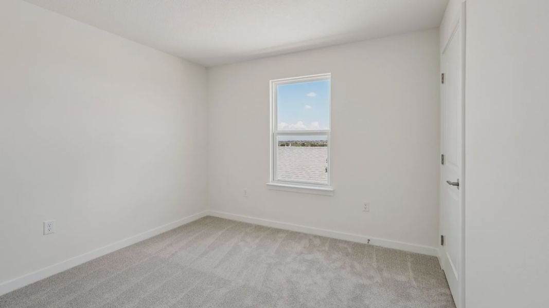 Third Bedroom located in the Jupiter in Hamilton Bluff located in Haines City, FL.